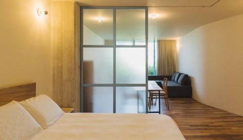 One-Bedroom Apartment with Balcony and City View