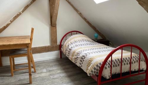 Single Bed in Dormitory Room