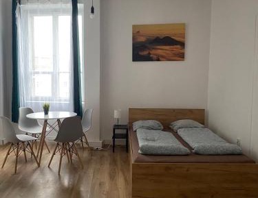 Quadruple Room with Shared Bathroom