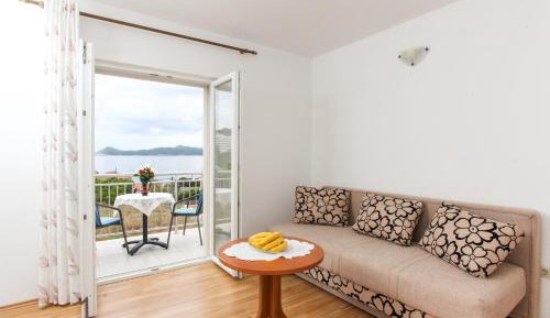 One-Bedroom Apartment with Balcony and Sea View