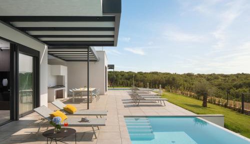 Three-Bedroom Villa with an Indoor and Outdoor Pool