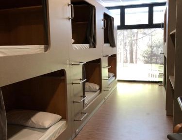 Single Bed in Dormitory Room