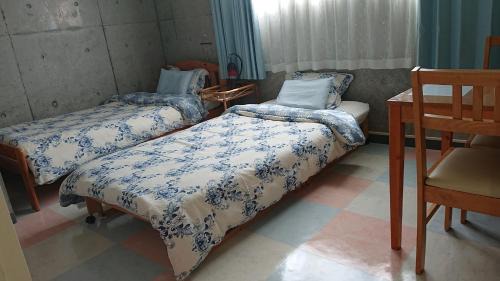 Twin Room with Shared Bathroom