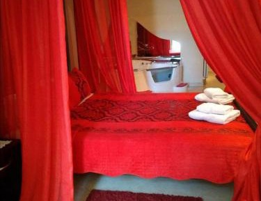 Suite with Hot Tub and Fireplace