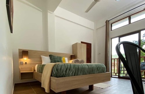 Aburi Apartment | The Treehouse Studio apartments with a large rooftop terrace.
