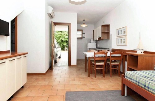 Bibione Lido del Sole Apartment | Terraced house in the Ca' del Pino holiday complex with communal pool in Bibione