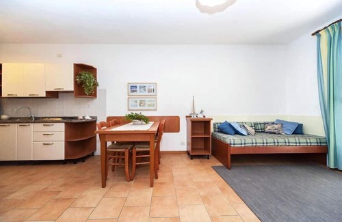 Bibione Lido del Sole Apartment | Terraced house in the Ca' del Pino holiday complex with communal pool in Bibione