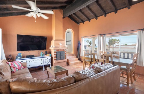 Las Conchas House | Arena y Sol - Vibrant two story home with colorful atmosphere
