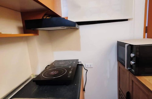 Cainta Condo | Charming 2BR Condo in Cambridge With Wifi, Smart TV