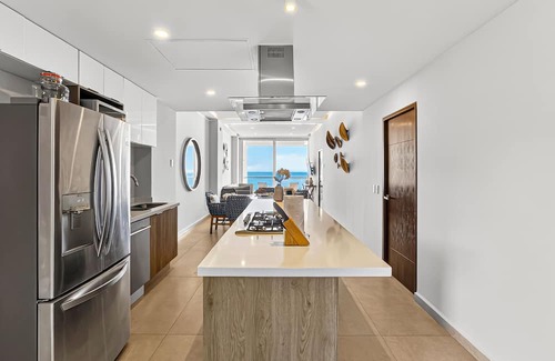 Las Glorias Apartment | Beachfront 2BR - Pools & Balcony Views