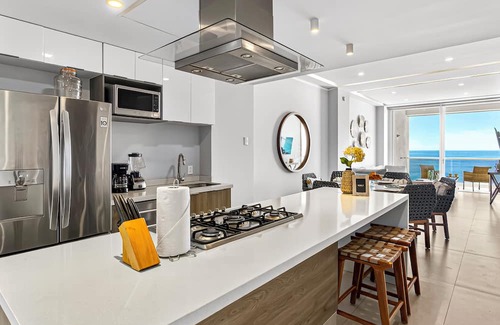 Las Glorias Apartment | Beachfront 2BR - Pools & Balcony Views