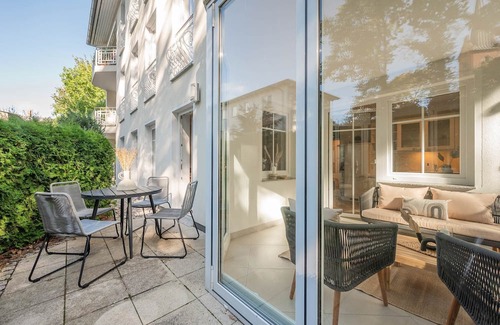 Zinnowitz Apartment | Quartier am Kirchberg - 02 - quiet residential complex with conservatory and fireplace