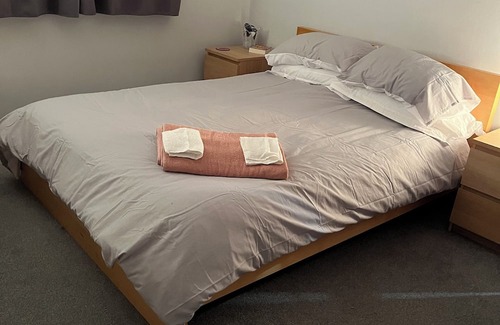 Perth Apartment | Bright and spacious bedroom. Forget your worries in this spacious, serene space.