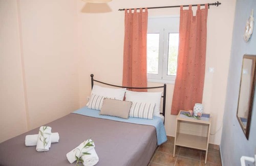 Pigadia Apartment | Apartment 'Ktima Develekou 1' with Sea View, Wi-Fi and Air Conditioning