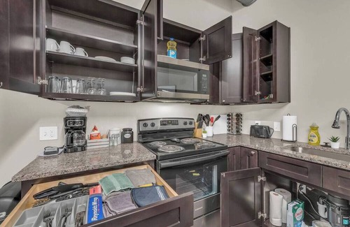 Waldron Apartment | Sleek, modern loft minutes from Airport, FAST WiFi