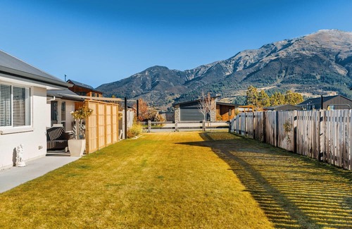 Lake Hawea House | Home nestled in Hawea - A four-bedroom Hawea home with mountain views. Enjoy a modern kitchen, spacious living areas, two bathrooms, and a cosy fireplace