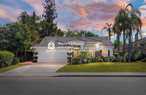 Greenacres House | Back Yard with Lawn & Dedicate Office & Single-Story