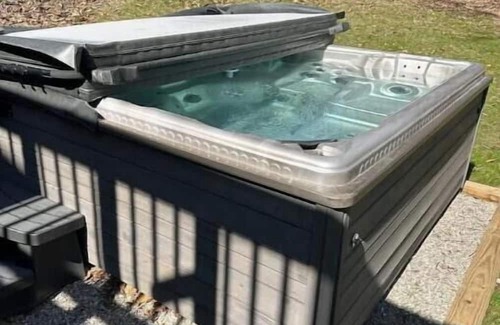 Gnaw Bone House | Peaceful home minutes from town. Hot tub, fire pit, game room. Dog friendly!