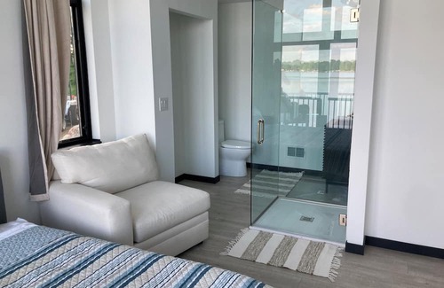 Delton House | MODERN & NEW Lake Home w/swimmable beach and built in entertainment