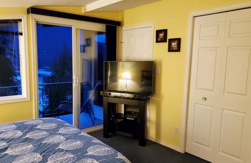 Eagle Bay Bed & Breakfast | Suite Retreat at the Lakehouse, with lake access and beautiful lake views.