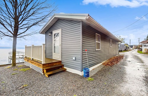 Town of Ledyard House | Lakefront home with private dock, lake views, deck, grill, streaming, & 1 kayak