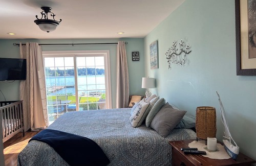Shelton House | Lakefront property, beautiful view with steps into water, large private dock.