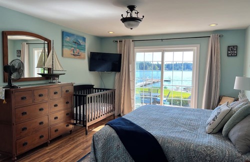 Shelton House | Lakefront property, beautiful view with steps into water, large private dock.