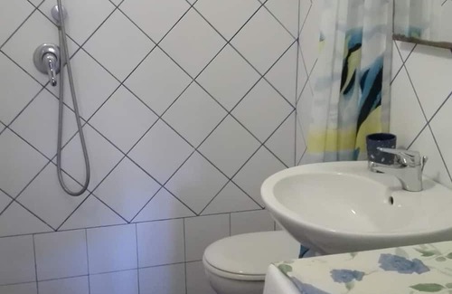 Giannella House | Holiday Home 'Residence Giannella - Gardenia 12' with Private Garden