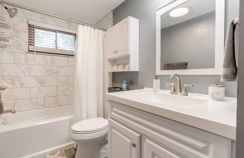 Columbus House | Newly remodeled home, spacious deck w/ string lights, & large yard with firepit