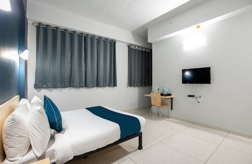 Tirupur Hotel | Capital O New Paradise Inn