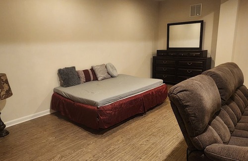 Triangle House | Walk in sunny furnished basement with 2 bedrooms and 2 bathrooms