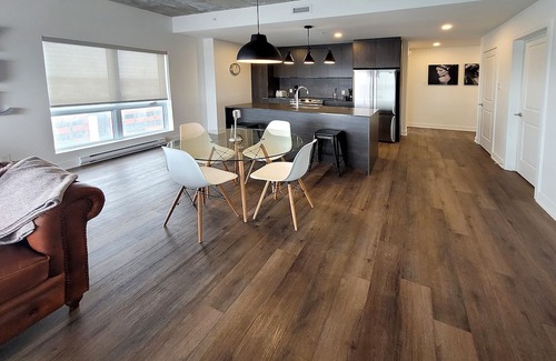 Fabreville Apartment | Corporate Stays - Luxurious 2BR with Stunning Rooftop Views Luxury & Gym Accessn