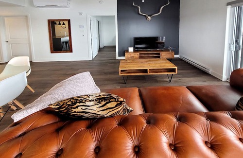 Fabreville Apartment | Corporate Stays - Luxurious 2BR with Stunning Rooftop Views Luxury & Gym Accessn