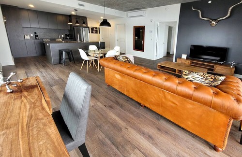 Fabreville Apartment | Corporate Stays - Luxurious 2BR with Stunning Rooftop Views Luxury & Gym Accessn