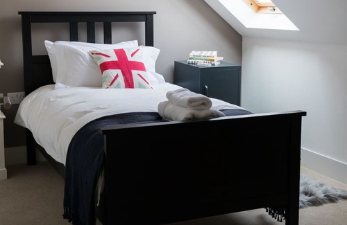 Banchory Cottage | This semi-detached stone house forms part of a once-derelict Victorian barn
