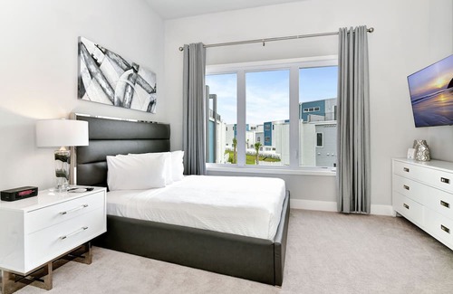 Reunion House | Spacious Modern Condo with Pool Table, Rooftop Terrace and Large Loft. Reunion Resort Water Park Access near Disney at Spectrum Resort Orlando by Rentyl - B32 #238