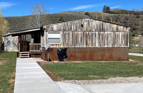 Freedom House | Newly remodeled home with a Barnwood rustic siding and an updated clean interior
