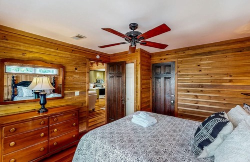 Newberry Shores House | Unique waterfront home with direct water access, dock, firepit, porch, W/D, AC