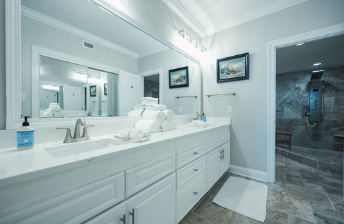 Orange Beach Condo | Luxe & Comfy Waterfront Gem: Heated Pool, Sandy Beach, Kayaks, Panoramic Views!