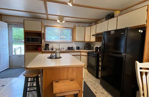 Denare Beach Cottage | Cozy Private lake front cabin with sand beach!