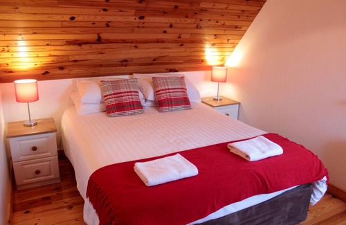 Annaghdown Cottage | Murrays Traditional Stone Cottage, near lake
