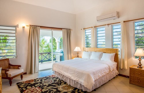 Island Harbour House | Exquisite 3 Bedroom villa. Unwind with beach views, and gentle island breezes.