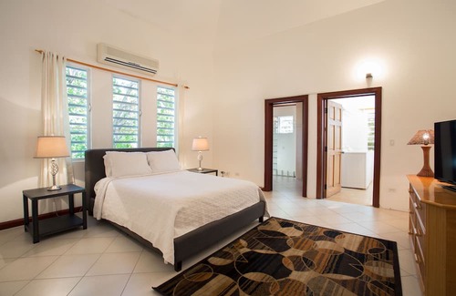 Island Harbour House | Exquisite 3 Bedroom villa. Unwind with beach views, and gentle island breezes.