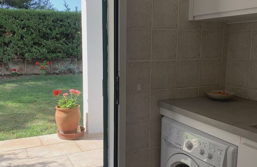 Arenal d'en Castell Ski Chalet | A stylish villa on the beach, with garden, pool and WIFI . pure rest