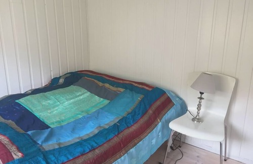 Leynar House | Cottage with stunning view of the sea and islands.