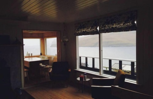 Leynar House | Cottage with stunning view of the sea and islands.