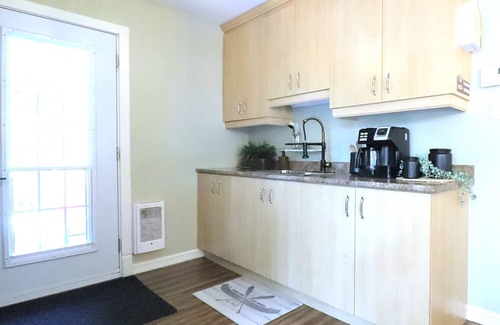 Saint-Remi-de-Tingwick Ski Chalet | Waterfront cottage with spa, close to many activities