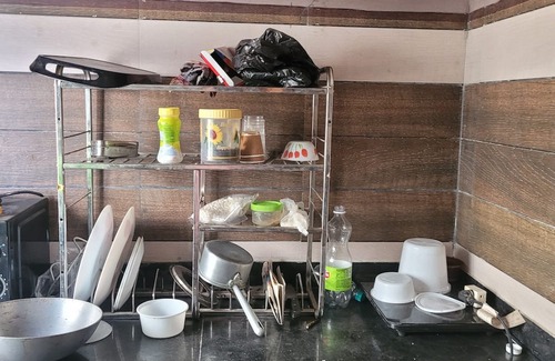 Thakurpukur Apartment | Elegant Spacious 2-bedroom AC Apartment balcony Kolkata Tollygunge~ pet friendly