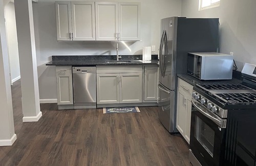 Old Bethpage House | Abundant space with a full kitchen next to trails and golfing