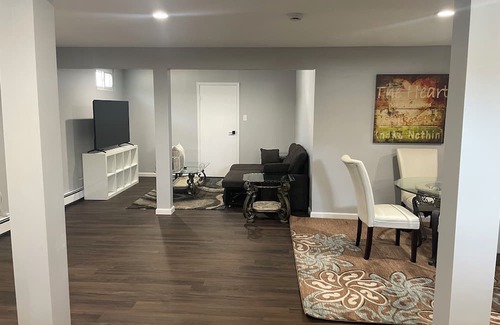 Old Bethpage House | Abundant space with a full kitchen next to trails and golfing